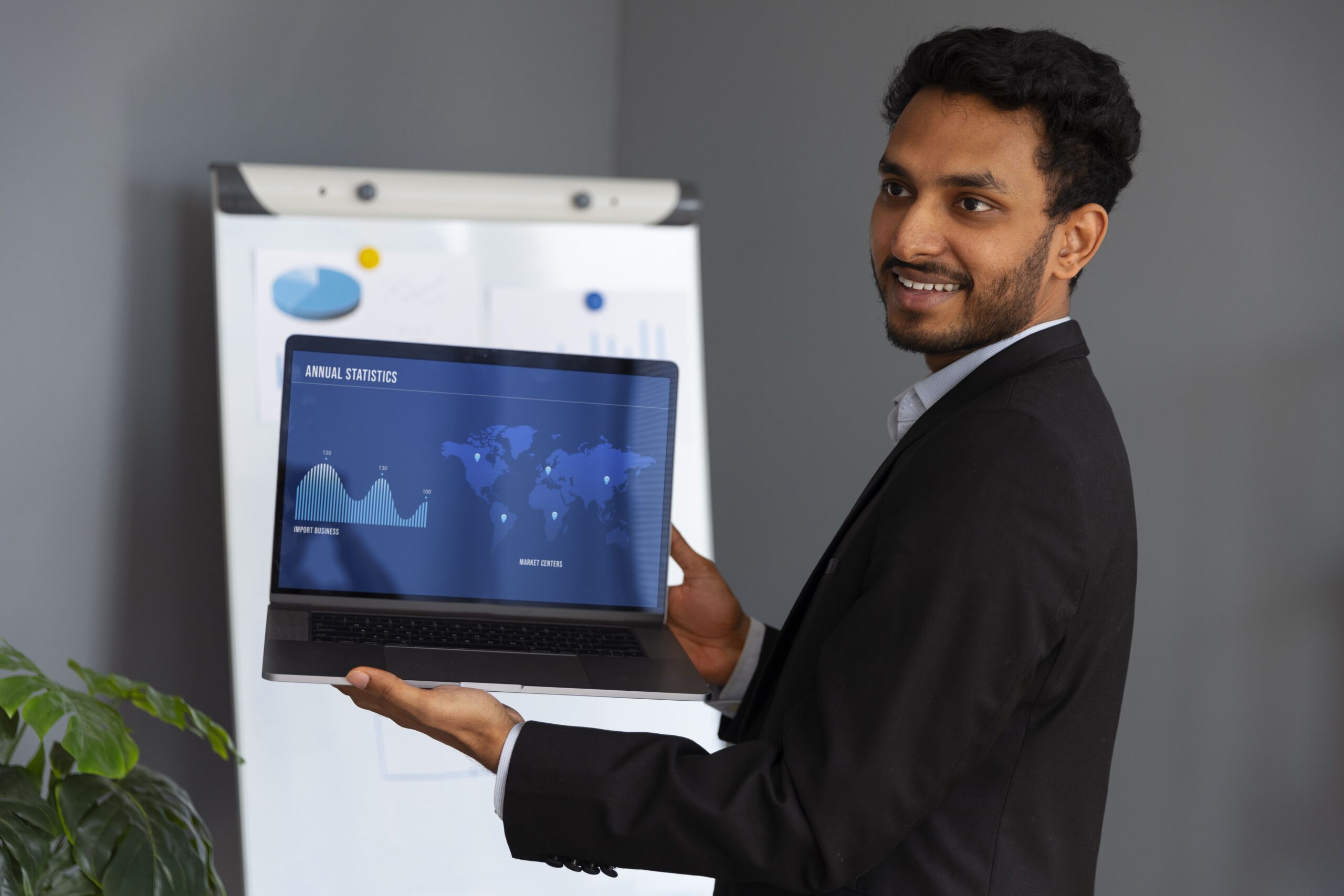 business-person-looking-finance-graphs (1)